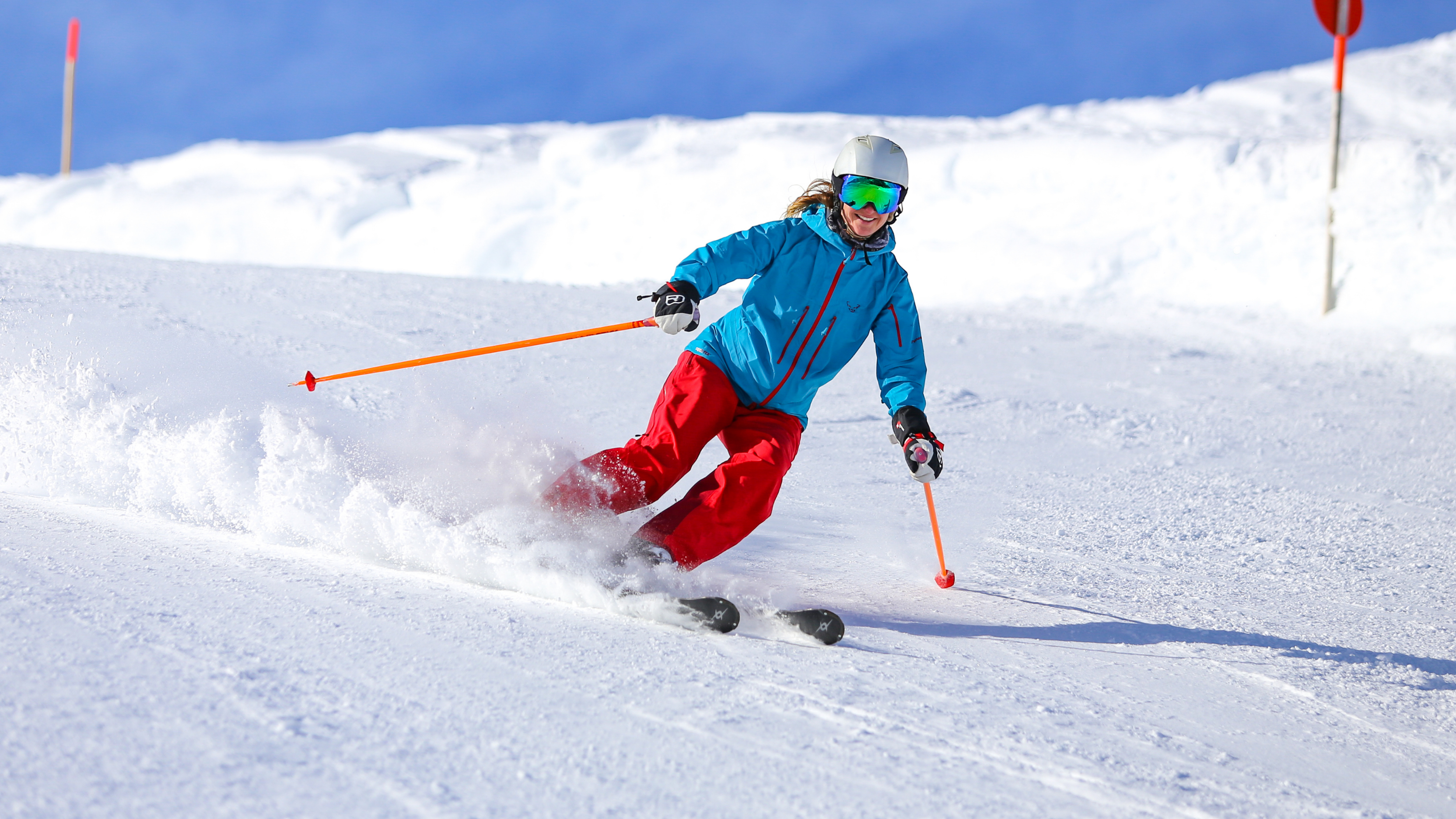 Blog6 Image: Woman skiing and smiling for the camera